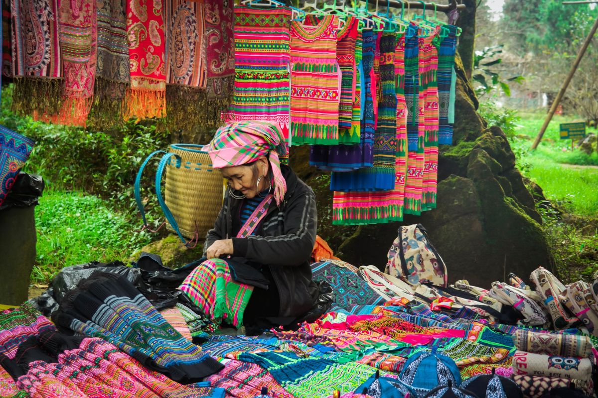Black Hmong woman weaving in Cat Cat Village